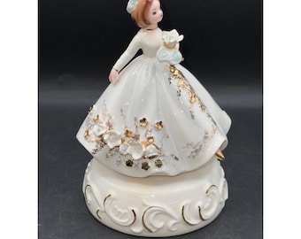 Carillon con statuetta girevole in ceramica VTG Josef Originals BRIDE "Ecco che arriva la sposa", bianco e oro, altezza 18 cm, diametro base 13 cm