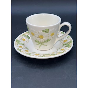 Metlox Poppytrail Sculptured Daisy Cup & Saucer Set