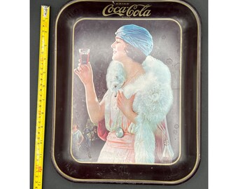 Vintage Coca-Cola serving tray with 1920s girl in white fox