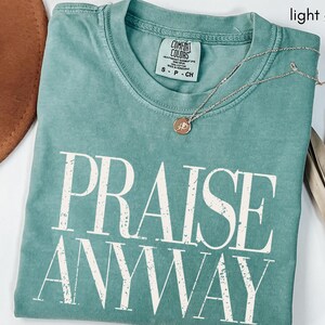 May include: A handmade wooden sign with the text "Welcome" in a whimsical font. The sign is painted white with a distressed finish, and features a decorative floral design in shades of pink and green. It is designed for indoor or outdoor use.