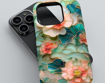 May include: A smartphone case featuring a vibrant floral pattern with pink and peach-colored flowers, teal and green wavy leaf shapes, and thin gold-colored outlines that define each element, set against a dark-colored smartphone device.