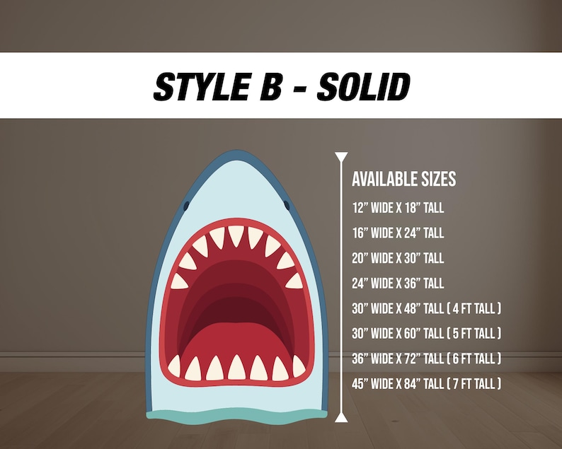 May include: A shark-shaped wall art cutout with an open mouth, featuring red teeth and a light blue exterior. The text "STYLE B - SOLID" is at the top. Available sizes range from 12" x 18" to 45" x 84".