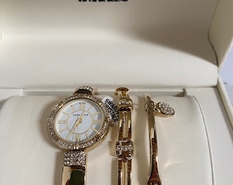 Anne Klein Women&#39;s Premium Crystal Accented Bangle Watch and Bracelet Set