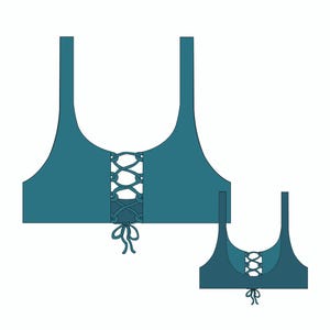 May include: Two teal blue crop tops with a lace-up detail in the front. The top on the left has a longer strap and the top on the right has a shorter strap.