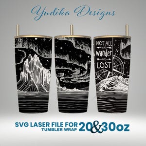 May include: SVG laser cut file for a 20 or 30 ounce tumbler wrap featuring a black and white design with a mountain range, aurora borealis, and the text "Not all who wander are lost".