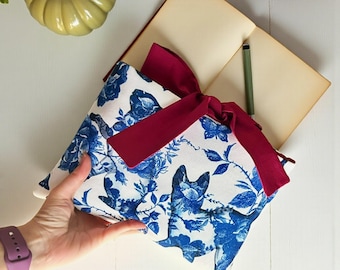 Funda para libro con silueta de gato floral y cinta, cubierta acolchada, protector de tapa blanda