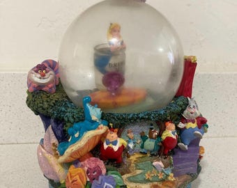 Walt Disney Alice in the Wanderland “All in a Golden Afternoon” 7.5” display snow globe