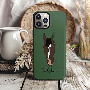 May include: A green phone case with a white horse head illustration and the word "Bolshoi" in white text.