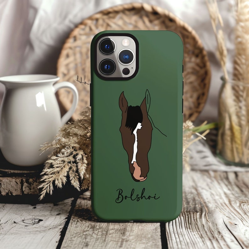 May include: A green phone case with a white horse head illustration and the word "Bolshoi" in white text.