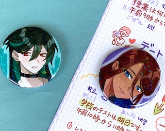 The kid at the back buttons TKATB 2 inch buttons, sol and crowe buttons 2inches.