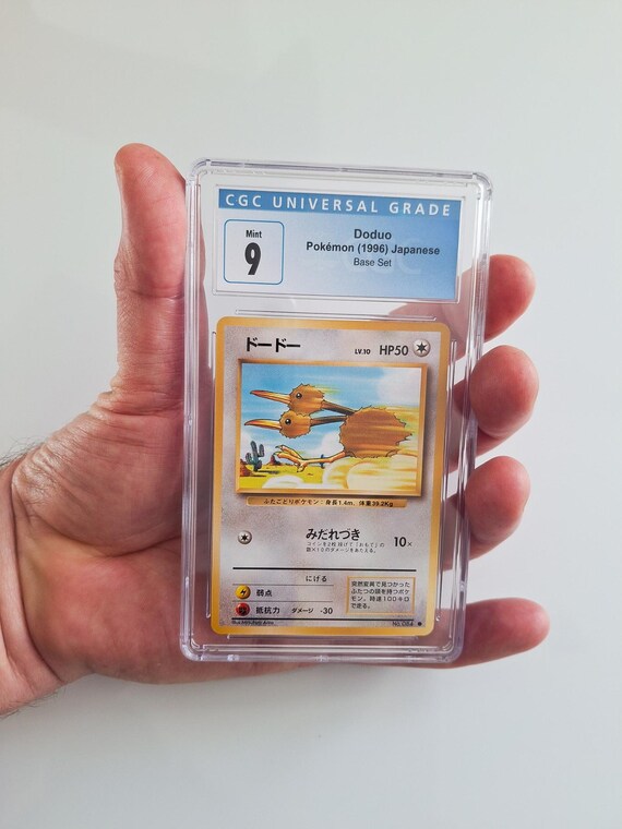 japanese doduo pokemon card Vintage 1996 Japanese Base Set Pokemon Card Doduo #084 CGC Graded 9
