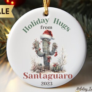 Holiday Hugs from Santaguaro Christmas Ornament | Saguaro Cactus Christmas Ornament | Fun Santa Christmas Ornament | Unique Christmas Gift
