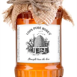 May include: A glass jar of honey with a hessian lid and a white label that reads "100% PURE HONEY Straight from the hive". The label also features a black and white illustration of a beehive.