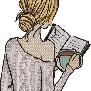 May include: A woman with blonde hair is reading a book while holding a cup of coffee. She is wearing a light brown sweater with a cable knit pattern.