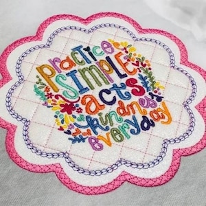 May include: Embroidered design with a scalloped border in pink and purple. The design features colorful text that reads "Practice Simple Acts of Kindness Everyday".