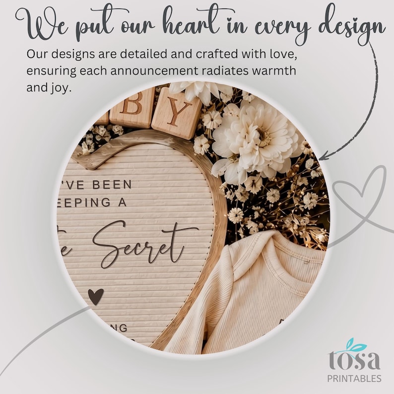 May include: A heart-shaped letter board with the text 'I'VE BEEN KEEPING A Little Secret' and a small heart icon. The board is surrounded by white flowers, wooden baby blocks, and a beige ribbed long-sleeve baby bodysuit. Text reads 'We put our heart in every design'.