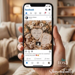 May include: A smartphone screen displaying a Facebook post featuring a baby announcement with a heart-shaped letter board reading 'We've been keeping a little secret', a teddy bear, baby booties, a onesie, and an ultrasound image in a wreath.