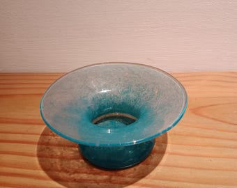 Small decorative green glass bowl