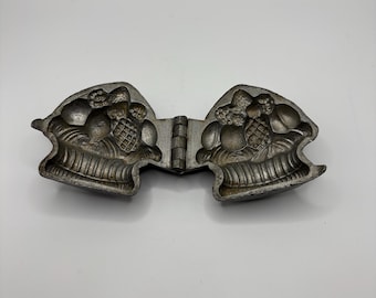 A metal vintage icecream mould
