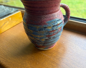 Michael Kennedy Irish Pottery Mug or Vase with handle, zig zag and star burst / flowers Design, Donegal Studio, Ireland.