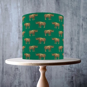 Motif sans couture de rhinocéros vert émeraude et or enveloppant le dessus de gâteau, feuille de glaçage, carte de gaufrette, emballage de gâteau, impressions comestibles