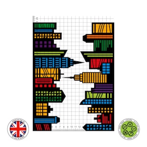 Sheet showing a black city skyline design with colourful red, blue, green, purple, and yellow windows, displayed on a 1cm grid with Made in the UK and vegan, gluten-free, nut-free, dairy-free, GMO-free certification icons.