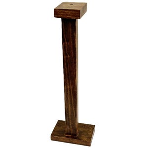 May include: A wooden stand with a square top and a square base. The stand is made of dark brown wood and has a simple design.