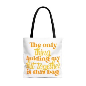 Holding it together Tote bag
