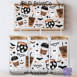 May include: Halloween-themed glass tumblers and a wooden sign featuring coffee cups, ghost, and bat illustrations. The tumblers have bamboo lids and straws. The sign and tumblers have a light gray background with orange and black accents.