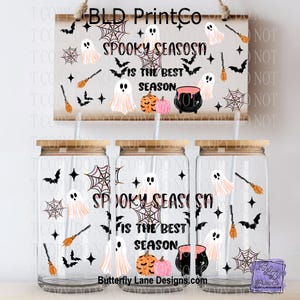 May include: Three clear glass tumblers with bamboo lids and straws, featuring a Halloween pattern of white ghosts, black bats, orange pumpkins, pink pumpkins, black cauldrons, spider webs, and brooms with the text SPOOKY SEASON IS THE BEST SEASON.