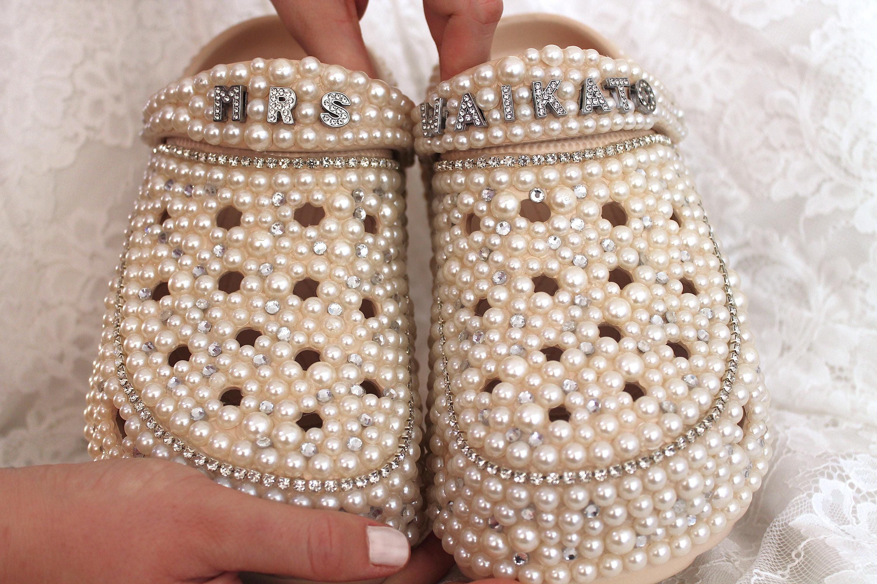 Handmade ivory pearl bridal slippers, a unique gift for the bride-to-be. Perfect for bachelorette parties and wedding celebrations