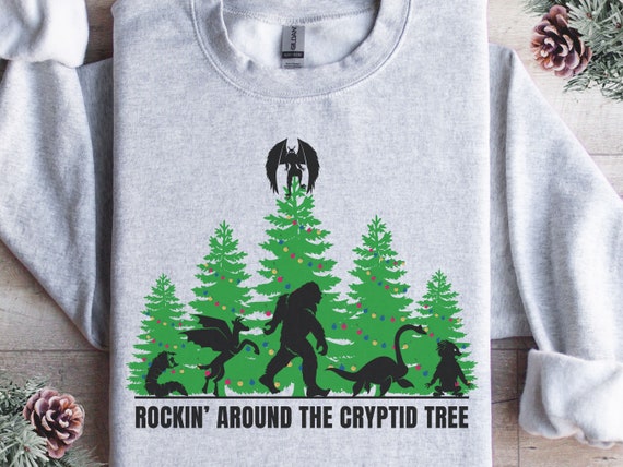 Cryptid Collections Sweatshirt, rockin around Christmas, Cryptozoologist Shirt, Cryptid Shirt, Mothman Shirt, Bigfoot Shirt, Loch Ness Shirt