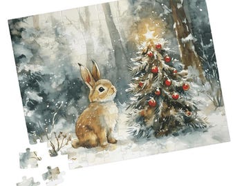 May include: A watercolour jigsaw puzzle depicting a brown rabbit in a snowy forest. A Christmas tree with red baubles and a star is in the background. Some puzzle pieces are separate. The scene evokes a winter theme.