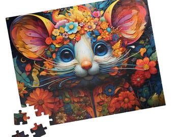 May include: A colorful jigsaw puzzle featuring a cartoon mouse with large ears and blue eyes. The mouse is surrounded by flowers and leaves in shades of red, orange, yellow, green, and blue.