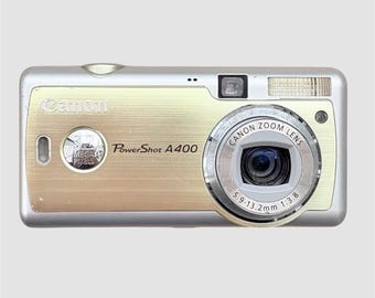 Canon PowerShot A400 3.2  MP digital compact camera WORKing + card