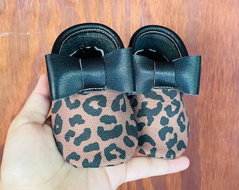 Chocolate Leopard Bow Moccs| Texas Moccs Handmade Baby Moccasins - Soft Sole Infants' Booties