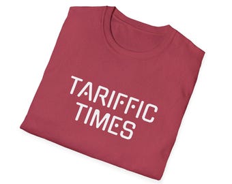 Puede incluir: Una camiseta roja con el texto "TARIFFIC TIMES" impreso en blanco.