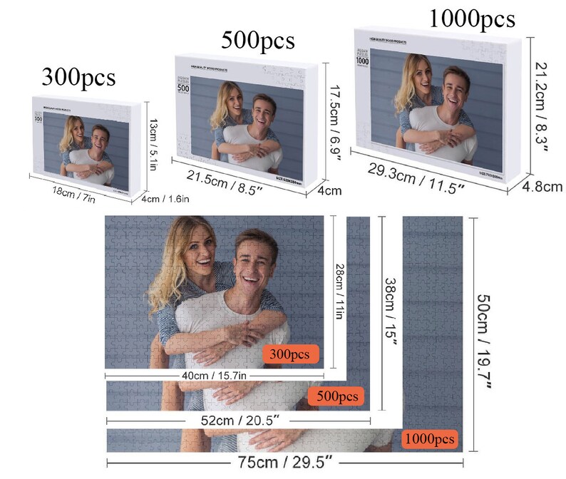 May include: Three different sizes of jigsaw puzzles featuring a couple. The puzzles are 300 pieces, 500 pieces, and 1000 pieces. The puzzles are white with a blue background and a picture of a couple in the centre. The couple are smiling and the man is holding the woman on his back. The puzzles are labelled with the number of pieces and the dimensions in inches and centimetres.