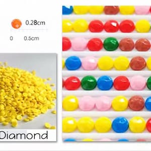 May include: Close-up of round, yellow diamond-shaped beads for diamond painting. The beads are approximately 0.28 cm in diameter. The image also shows a close-up of a finished diamond painting with colorful round beads.