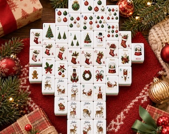 May include: A set of white Mahjong tiles arranged in a tree shape, each featuring colorful Christmas-themed illustrations including ornaments, stockings, reindeer, Santa Claus, snowmen, gingerbread men, and holiday greenery with text labels.