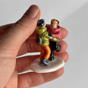 Ceramic sculpture of couple or family created from photos, handcrafted collectible figurine