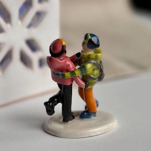 Artisan-made miniature figurine with custom colors, outfits, and poses inspired by real people