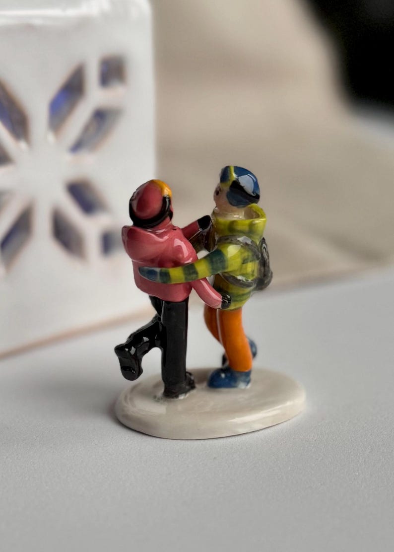 Artisan-made miniature figurine with custom colors, outfits, and poses inspired by real people