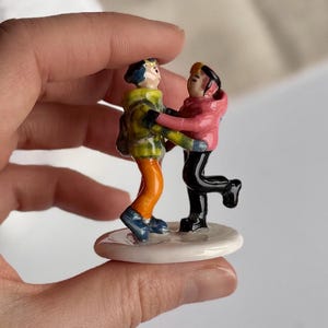 Personalized couple figurine sculpted by hand from clay, custom pose and clothing design