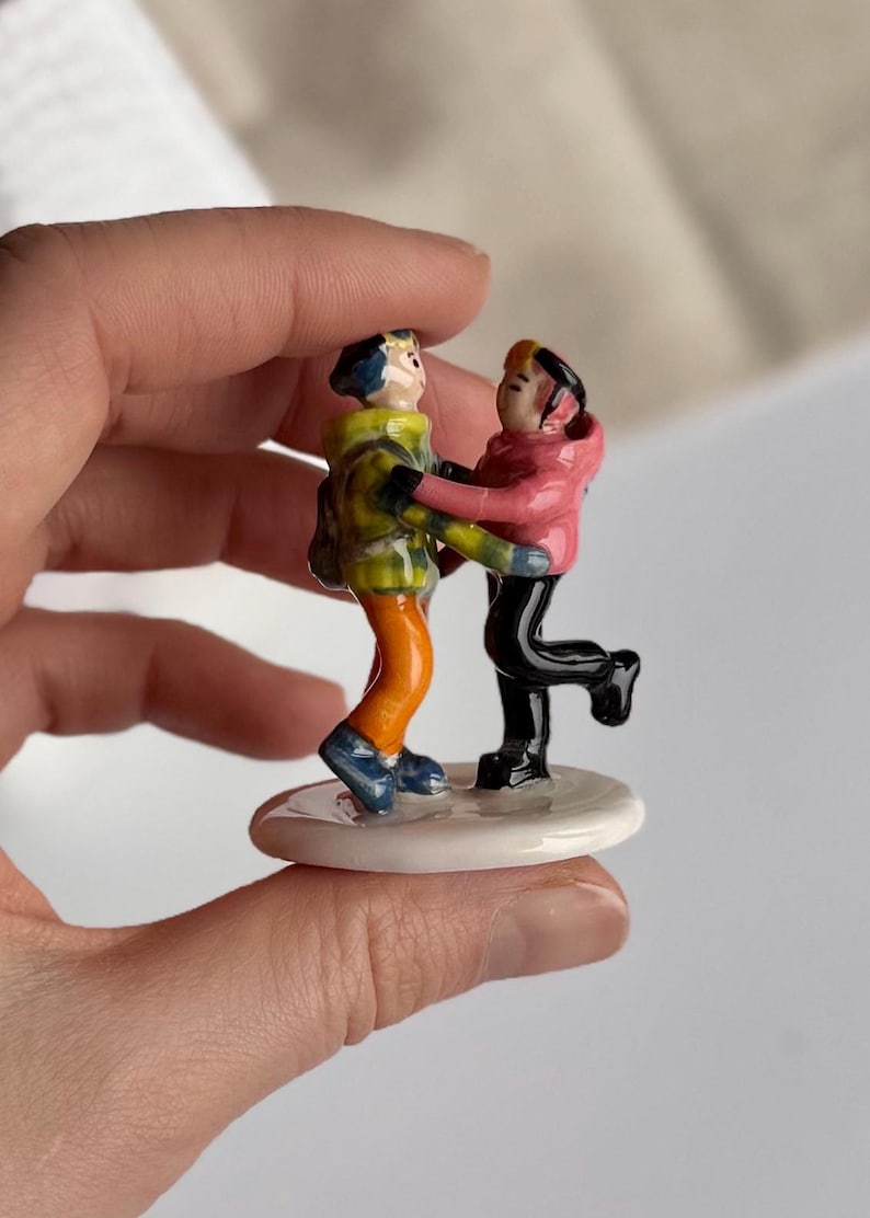 Personalized couple figurine sculpted by hand from clay, custom pose and clothing design