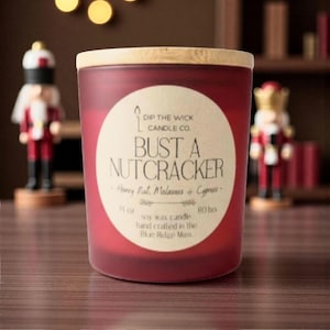 BUST A NUTCRACKER Scented Candle - Honey, Molasses and Cypress Scent, Funny Christmas Gift for Men, Stocking Stuffer, Secret Santa Gifts