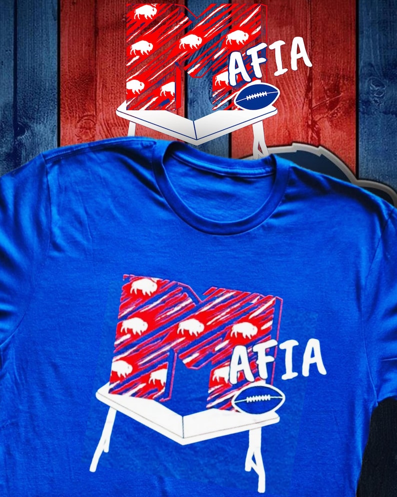 Buffalo Bills Mafia custom t shirt.  Mtv influenced, letter M crashing on top of table.  Royal blue color shirt. Next Level branded tee.