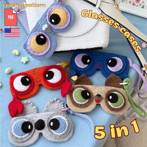 May include: Five handmade crochet glasses cases in various colors, each designed with large, cartoonish eye shapes. The cases include blue, orange, gray, and tan options, with the text "Glasses cases" and "5 in 1". The image also shows a crochet pattern PDF.