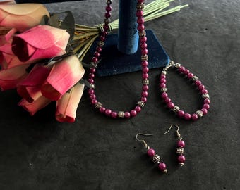 Conjunto de collar y pulsera de cuentas de vidrio