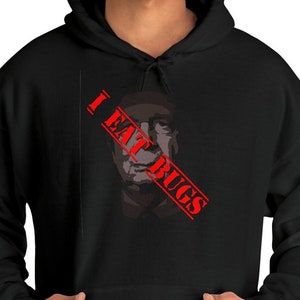 May include: Black hooded sweatshirt with a red diagonal line across the front. The line has the text "I EAT BUGS" in white letters.